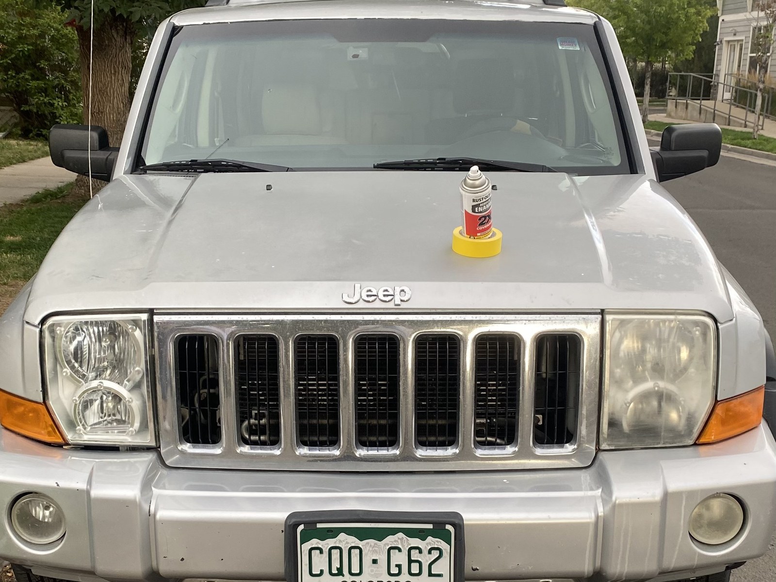 Jeep Commander with both headlight lenses hazed and oxidized